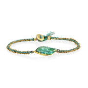 One of a kind 18k gold green Tourmaline leaf bracelet with hand woven silk and 18k gold chain from Los Angeles jewelry designer Brooke Gregson.