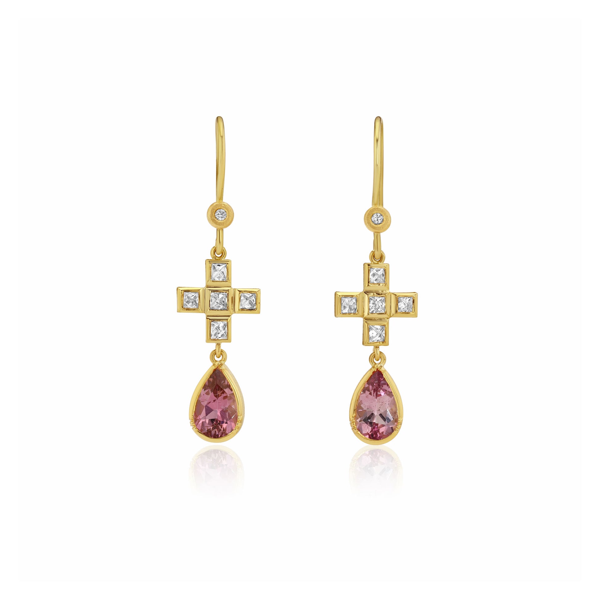18 carat gold earrings with pink tourmalines and white diamonds on a white background