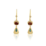 Gold earrings with green and red tourmalines on a white background