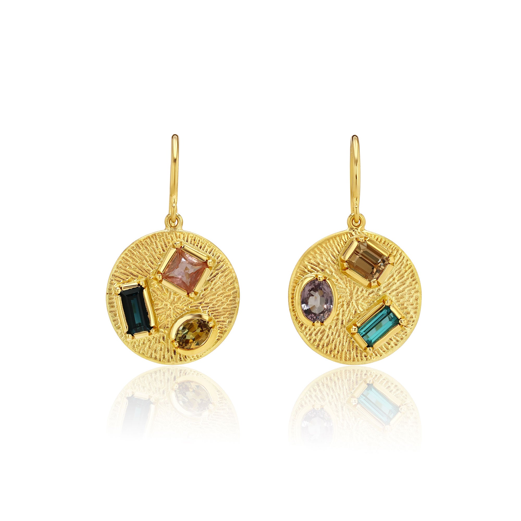 Gold earrings with embedded mixed sapphire gemstones on a white background