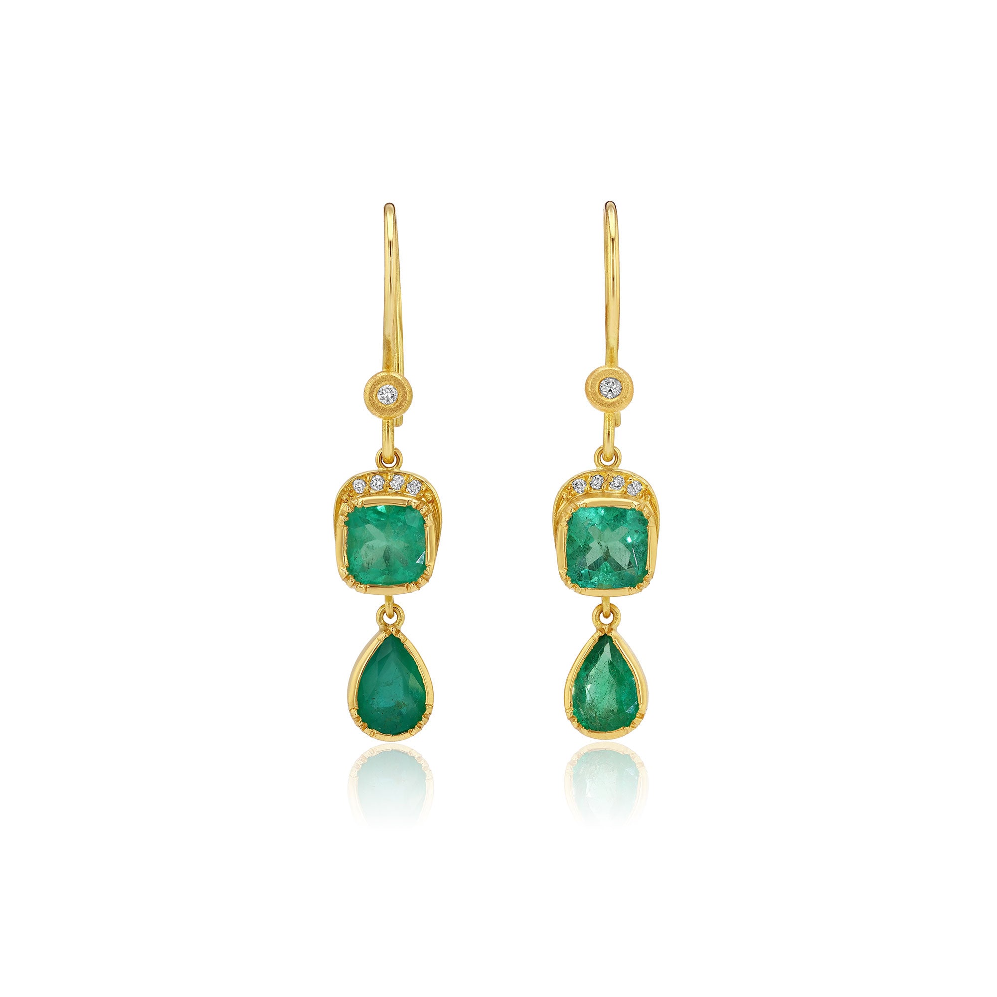 18k gold earrings with emerald green gemstones on a white background