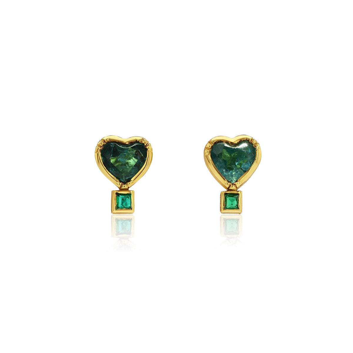 Gold heart shaped emerald and paraiba tourmaline stud earrings on a white background
