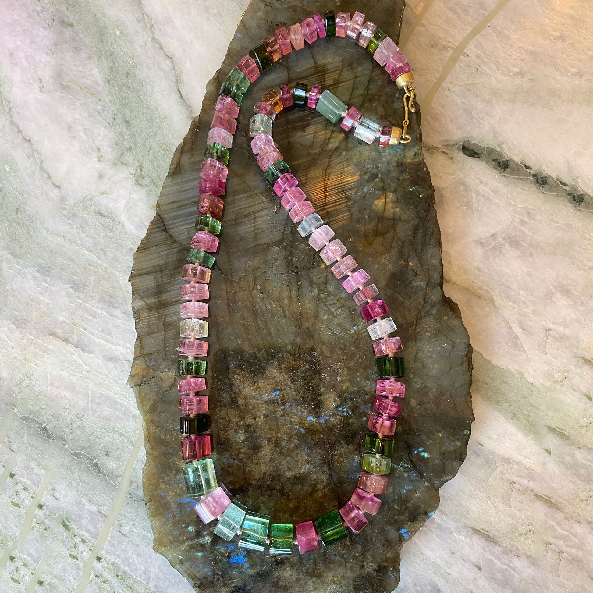 Gem quality mixed color tourmaline bead necklace with 18k gold clasp from Los Angeles jewelry designer Brooke Gregson.