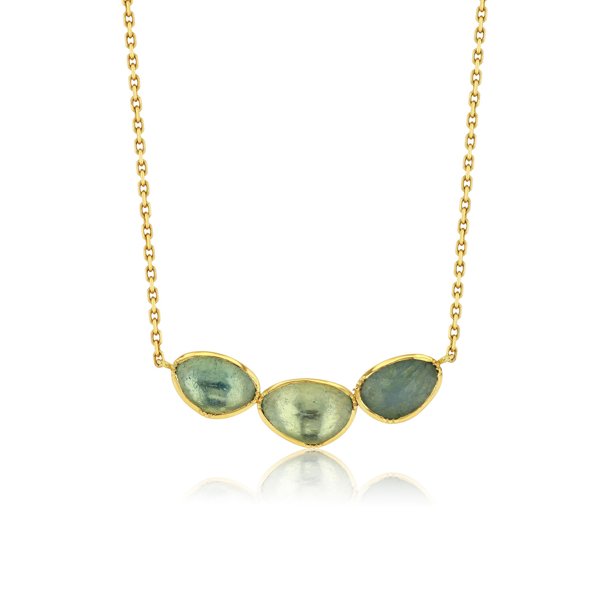 triple aquamarine necklace on a white background