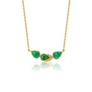 18K Gold necklace with green emerald gemstones and white diamond pave by jewelry designer brooke gregson on a white background