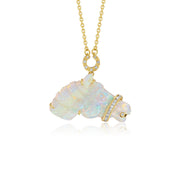 A gold pendant necklace featuring a stylized horse charm made of iridescent white australian opal with small diamond stones, suspended from a delicate gold chain on a white background.