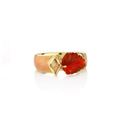 enamel and fire opal ring on a white background