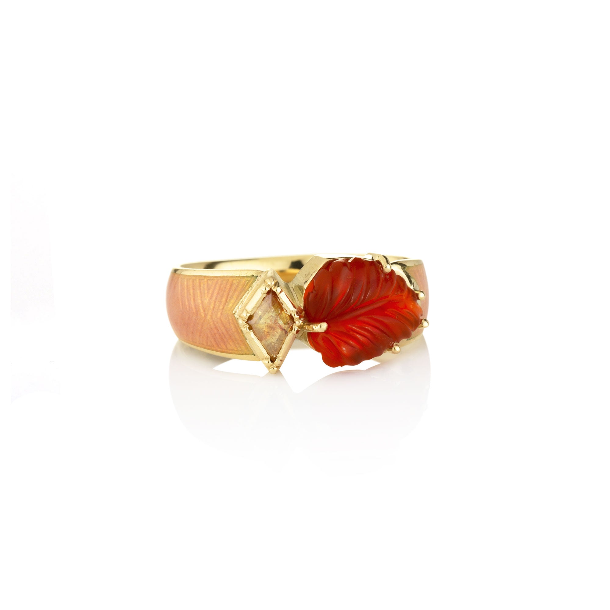 enamel and fire opal ring on a white background
