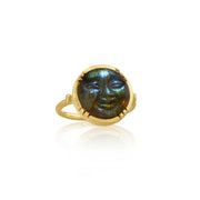 full moon shaped labradorite 18k gold ring with white diamond shoulder accents on a white background.