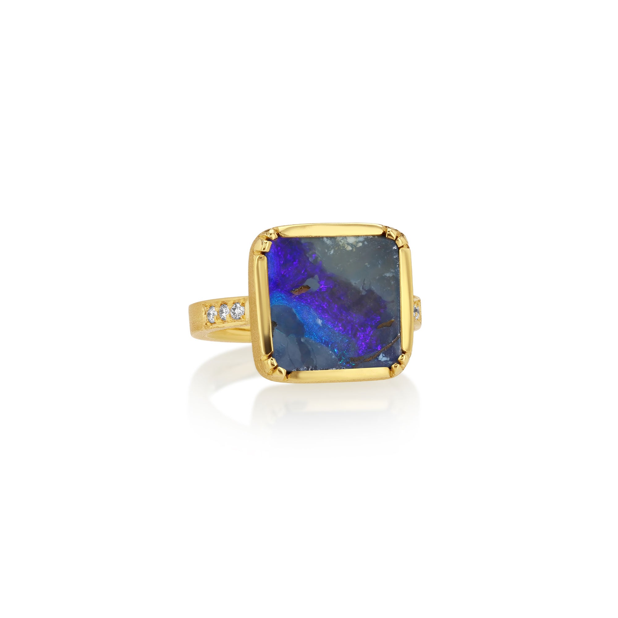 18k gold ring with a large boulder opal stone on a white background