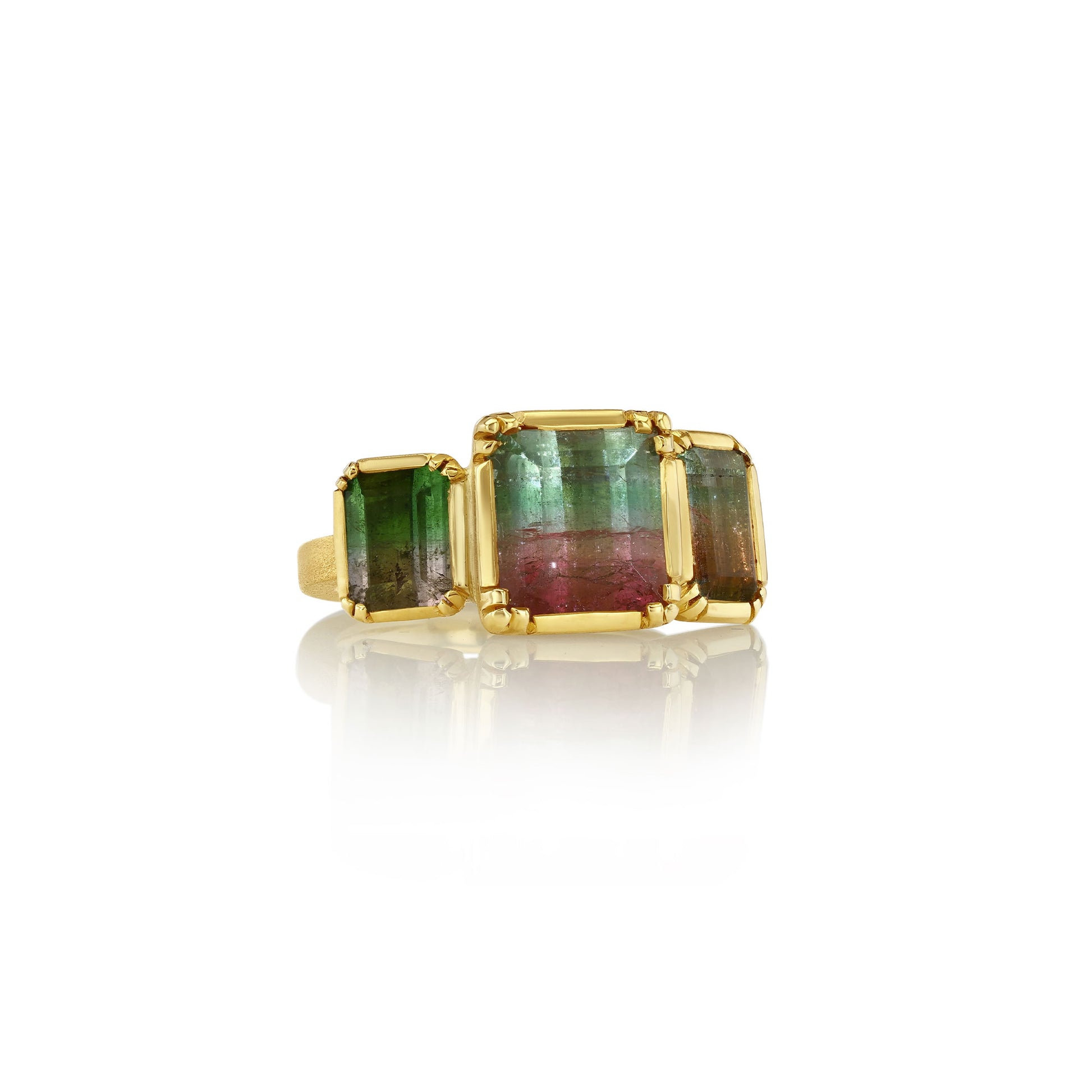 Product shot of triple bicolour tourmaline ring with 18 carat gold on a white background handmade by brooke gregson in London.