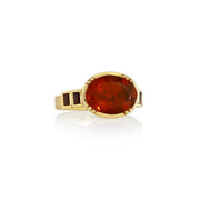 18k yellow gold ring with fire opal and ruby accents on white background