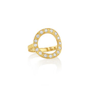 Gold ring with diamonds on a white background