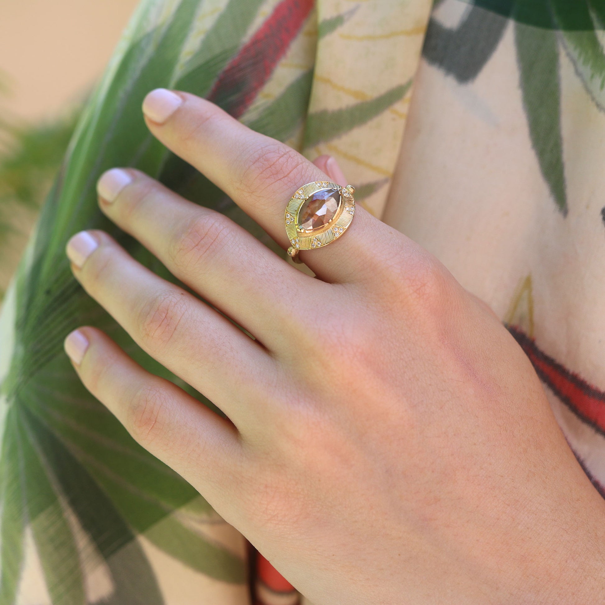 Model wearing one of a kind raw diamond Talisman Eye ring with white diamond pave from Los Angeles designer Brooke Gregson, fine jewelry handmade in London