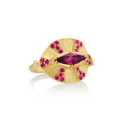 18k gold ring with ruby gemstones on a white background