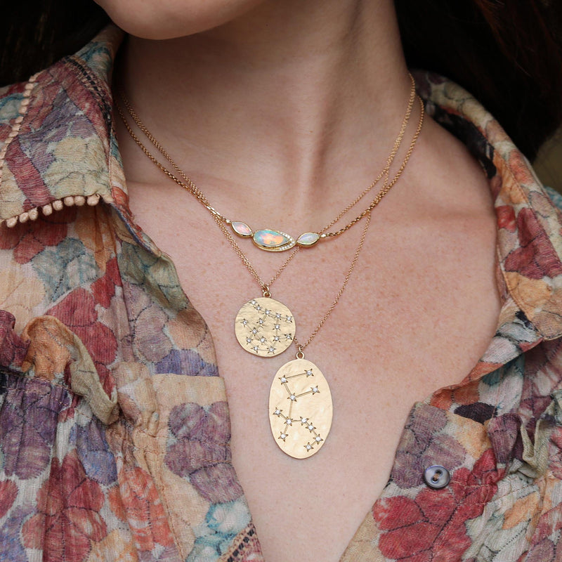 Modeal wearing Hand made in Los Angeles Brooke Gregson 14k gold Aquarius Zodiac Astrology Diamond Star Sign Necklace