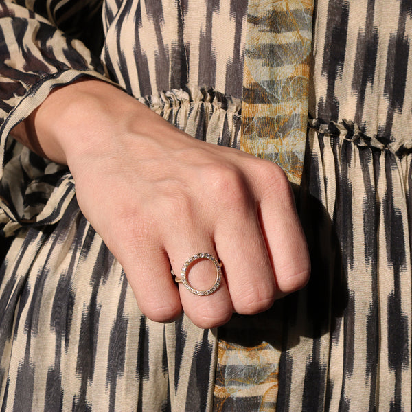 Model wearing Hand made in Los Angeles Brooke Gregson 14k gold white diamond pave Circle ring